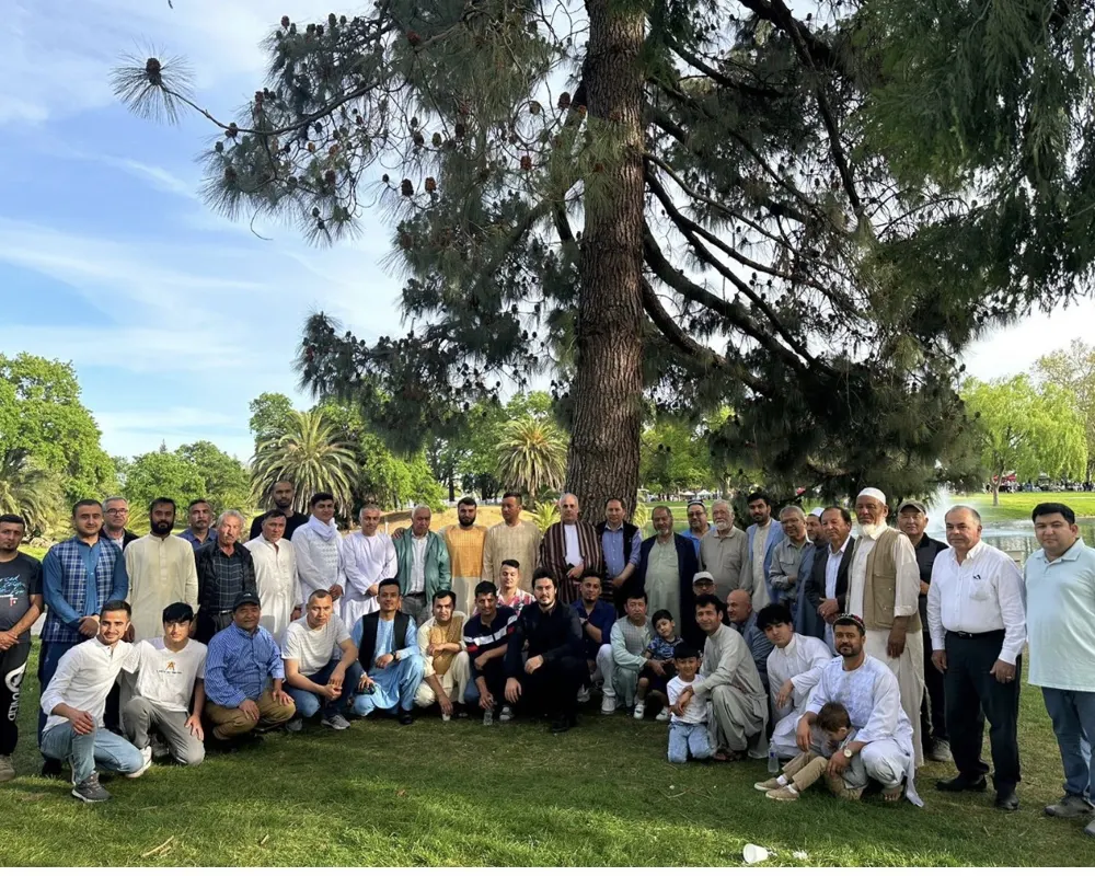 Members of the community gathered together in a California park